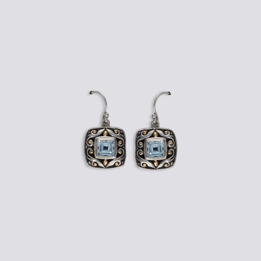 Sterling silver earrings with blue topaz stones
