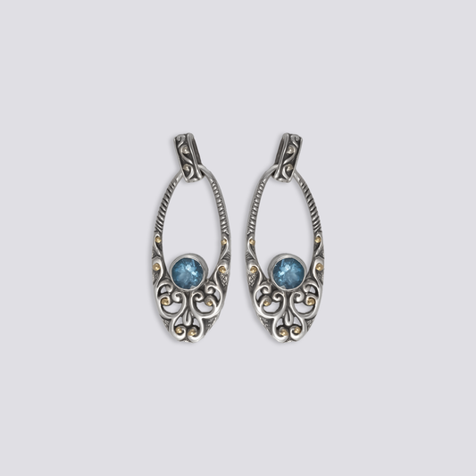 Sterling silver earrings with blue topaz stones